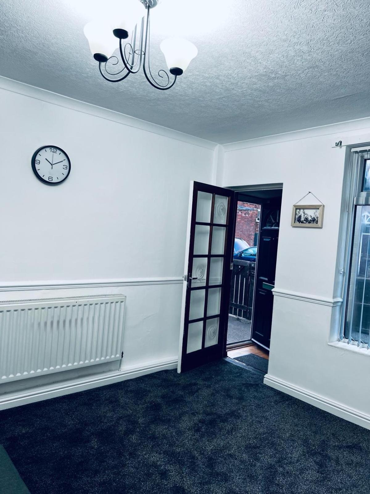 House Near Football Ground